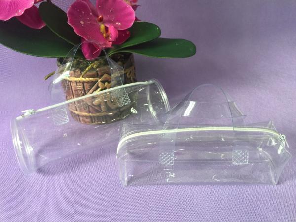 Buy Clear Handle PVC Packing Bag , Plastic Toy Round PVC Gift Bags at wholesale prices