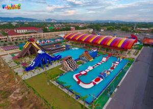 Quality Large Floating Water Parks Rentals 150m Inflatable Water Slides for sale