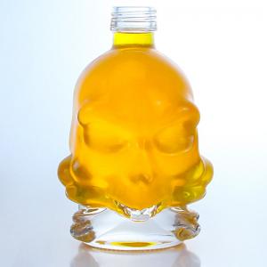 Quality Decal Surface Skull Shape Glass Liquor Bottle for Whisky Vodka Brandy Aging Technique for sale