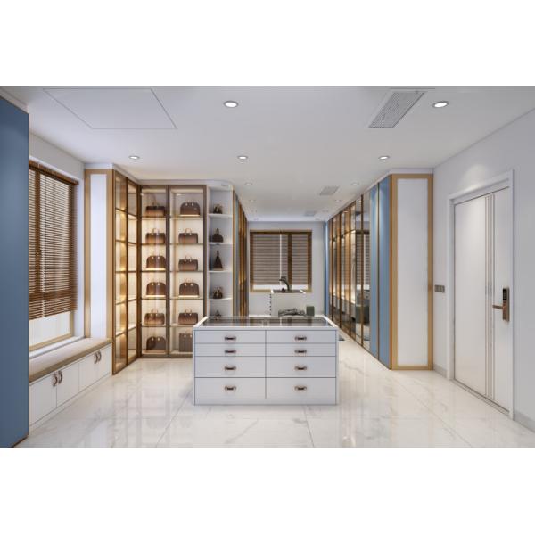 Blue Walk In Closet With Integrated Central Island Seamless Functionality