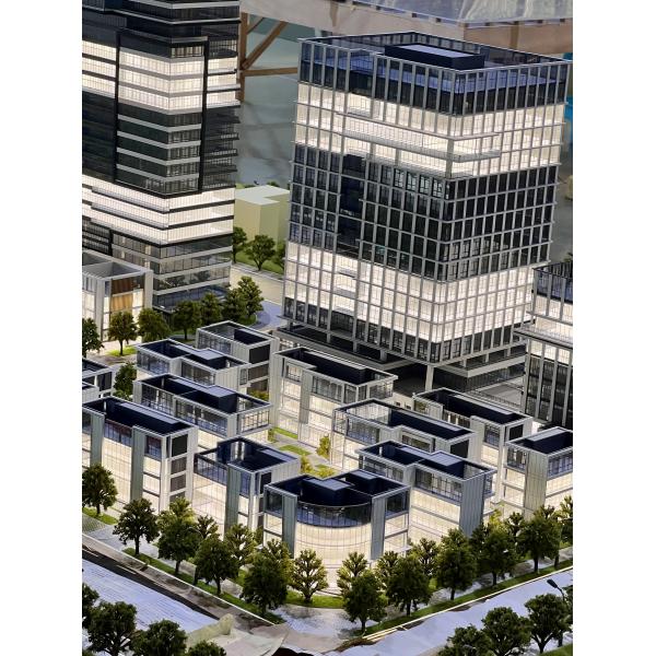 Architectural Model of Modern Urban Complex with Integrated Stadium, Business District and Landscaping