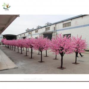 Quality UVG artificial pink flowering cherry tree in wooden trunk for exhibition hall decoration CHR035 for sale
