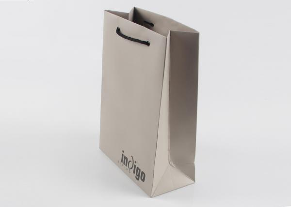 Buy Eco Friendly Paper Shopping Bags With Nylon Rope Handles And Spot UV Surface Finishing at wholesale prices