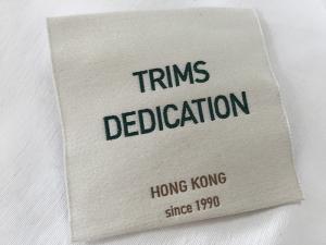 Quality Cotton Thread Brocade Woven Clothing Labels Beige Background High Density for sale